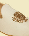 alt message - Manyavar Men Soft Cream Self Embroidered Juttis image number 1