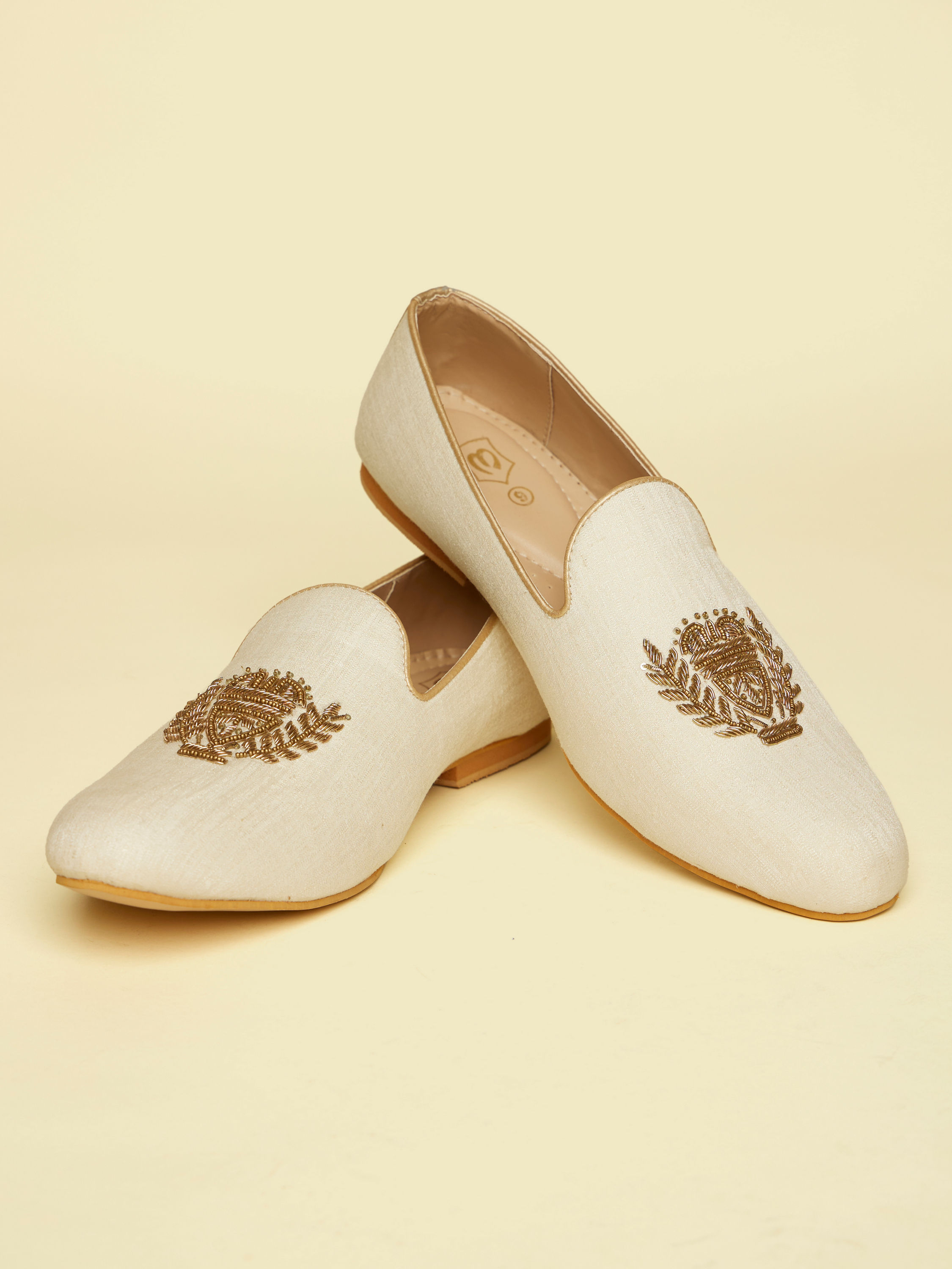 Manyavar Men Soft Cream Self Embroidered Juttis