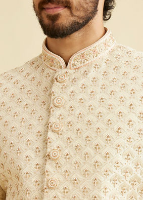 alt message - Manyavar Men Golden Cream Patterned Sherwani Set image number 1