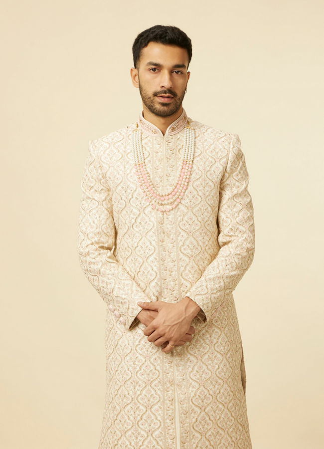 alt message - Manyavar Men Antique White Jaal Patterned Sherwani Set image number 0