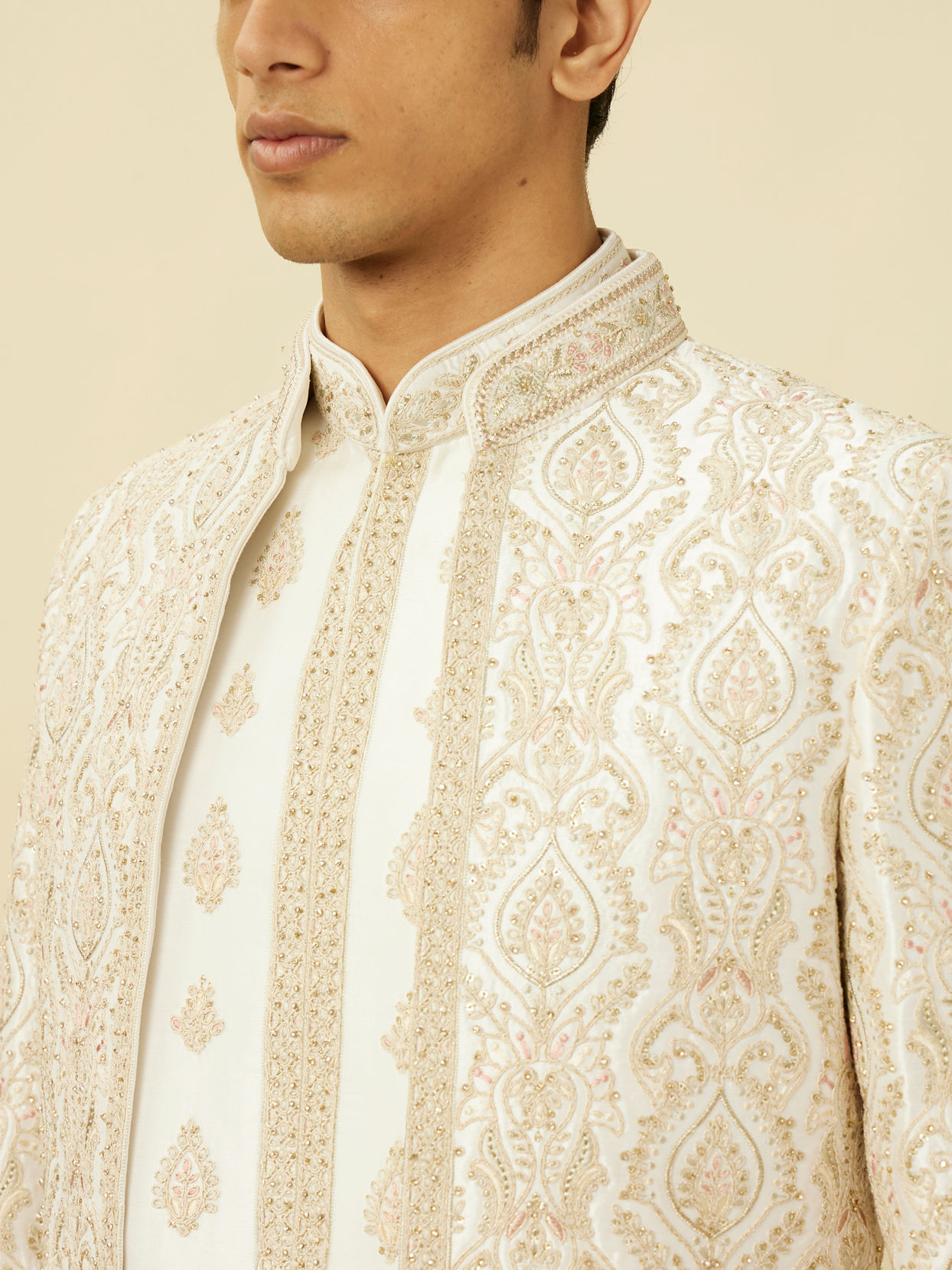 alt message - Manyavar Men Off White Shankh Motif Sherwani Set image number 1