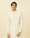 alt message - Manyavar Men Off White Floral Jaal Patterned Sherwani Set image number 0