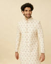 alt message - Manyavar Men Pearled Ivory White Jaal and Floral Patterned Sherwani Set image number 0