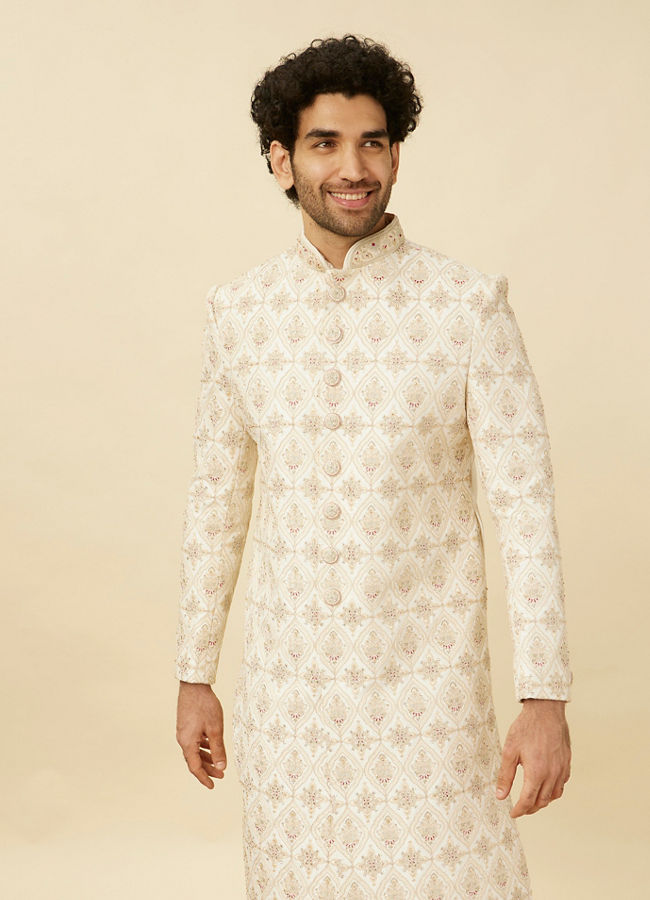 alt message - Manyavar Men Pearled Ivory White Jaal and Floral Patterned Sherwani Set image number 0