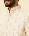 alt message - Manyavar Men Cream Beige Shankh Motif Sherwani Jacket Set image number 1