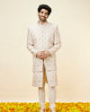 alt message - Manyavar Men Warm White Floral Trellis Patterned Sherwani Set image number 4