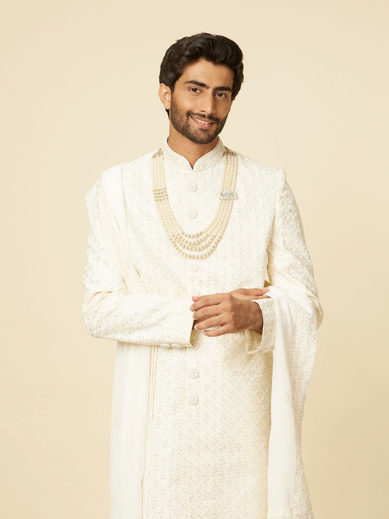 alt message - Manyavar Men Warm White Sequined Sherwani Set image number 0