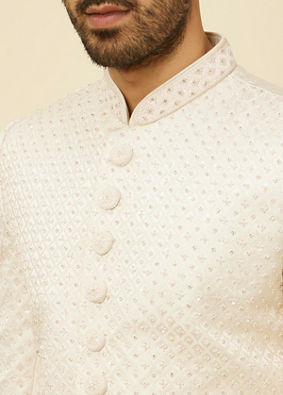 alt message - Manyavar Men Warm White Self-designed Sherwani Set image number 1