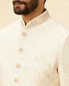 alt message - Manyavar Men Cream Pink Diamond Patterned Sherwani Set image number 1