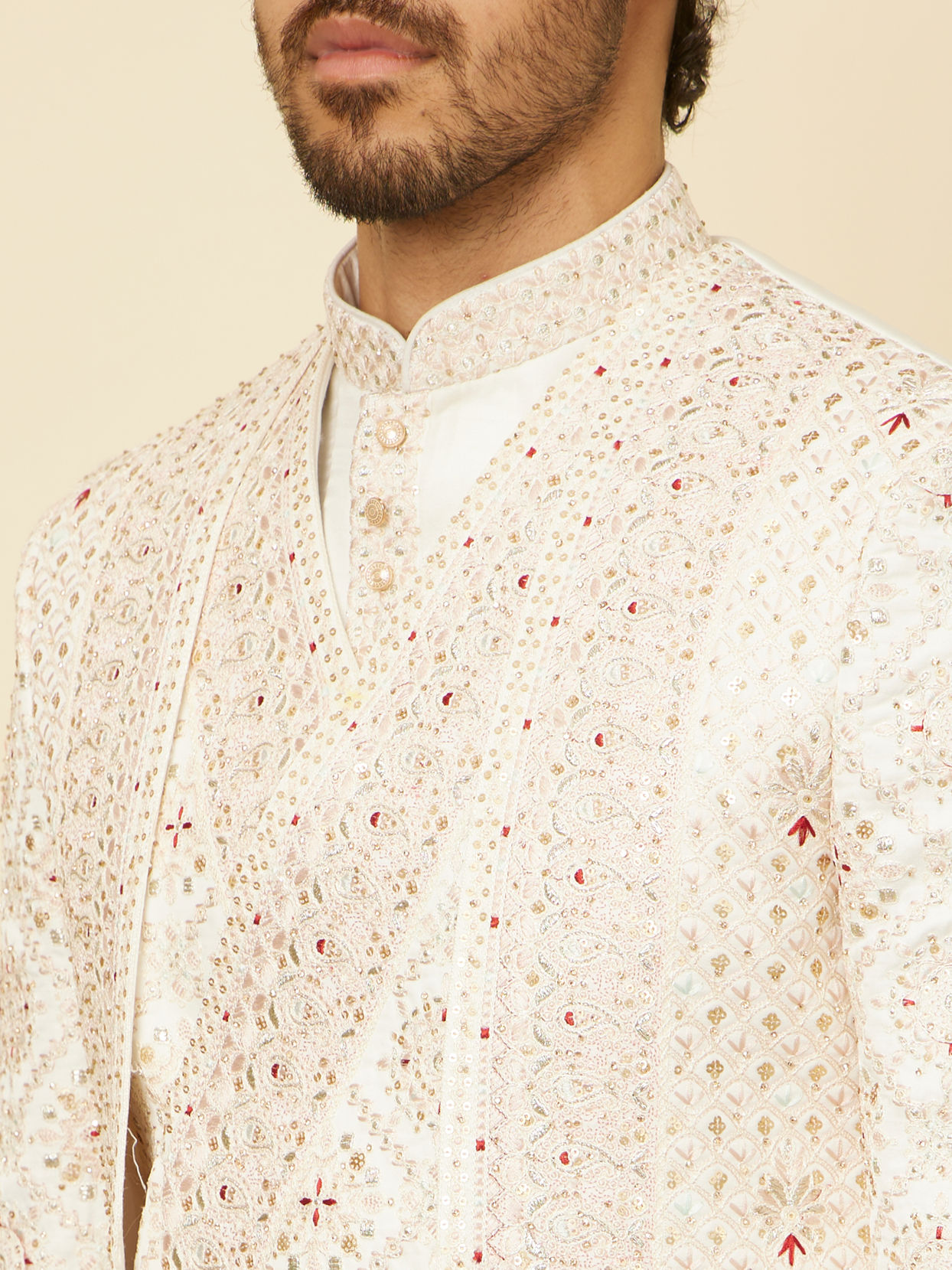 alt message - Manyavar Men Warm White Aari Embroidered Sherwani Set image number 1