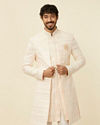 Cream Peach Self designed Sherwani Set