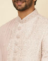 alt message - Manyavar Men Cloud Pink Self Patterned Rhinestone Embellished Sherwani Set image number 1