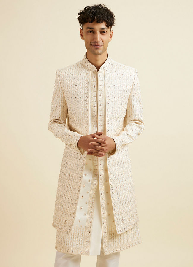 alt message - Manyavar Men Warm White Art Silk Sherwani image number 0