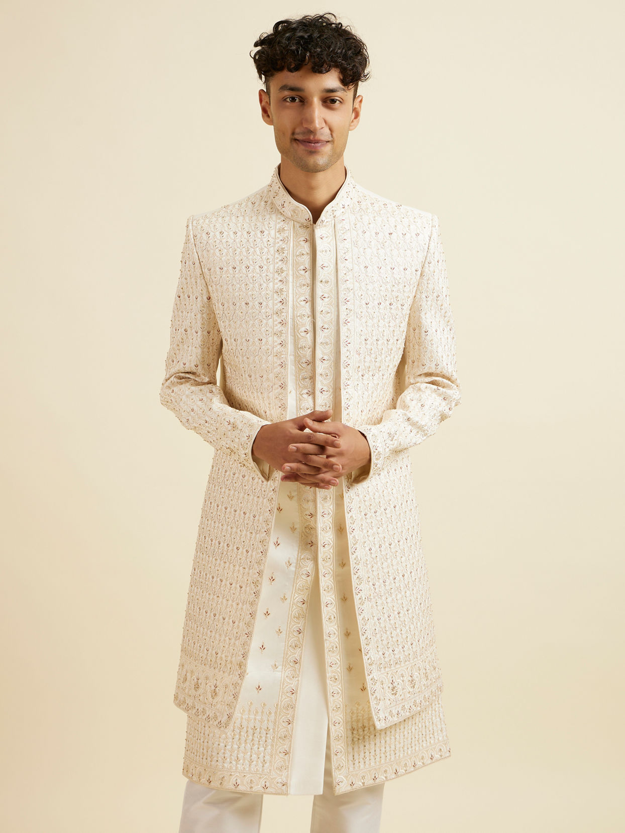 alt message - Manyavar Men Warm White Art Silk Sherwani image number 0