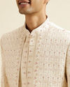 alt message - Manyavar Men Warm White Art Silk Sherwani image number 1