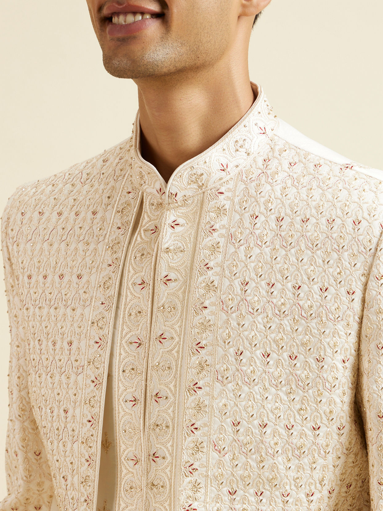 alt message - Manyavar Men Warm White Art Silk Sherwani image number 1