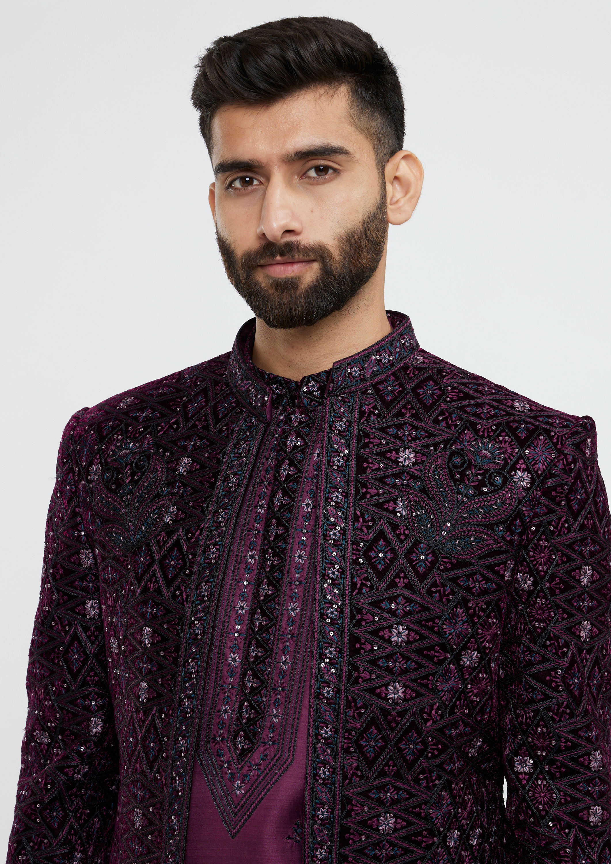 alt message - Twamev Men Wine Red Sherwani Set with Geometric Patterns and Rhinestones image number 1