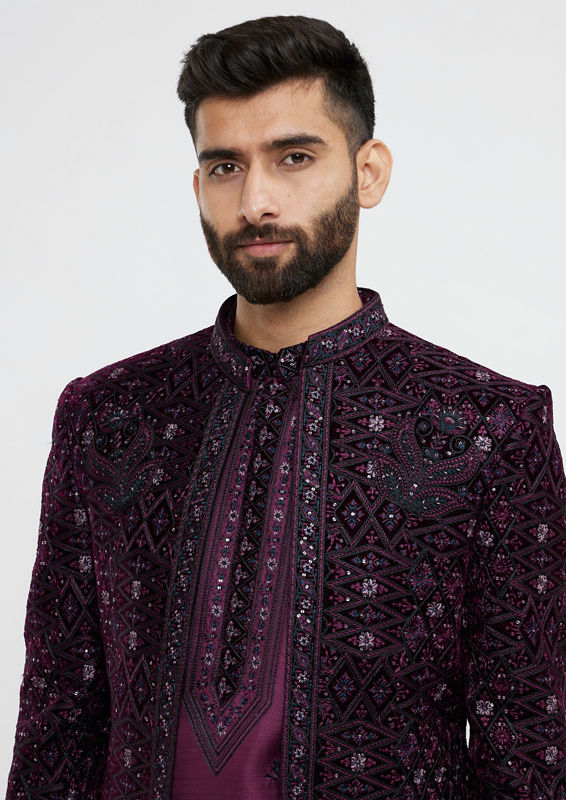 alt message - Twamev Men Wine Red Sherwani Set with Geometric Patterns and Rhinestones image number 1