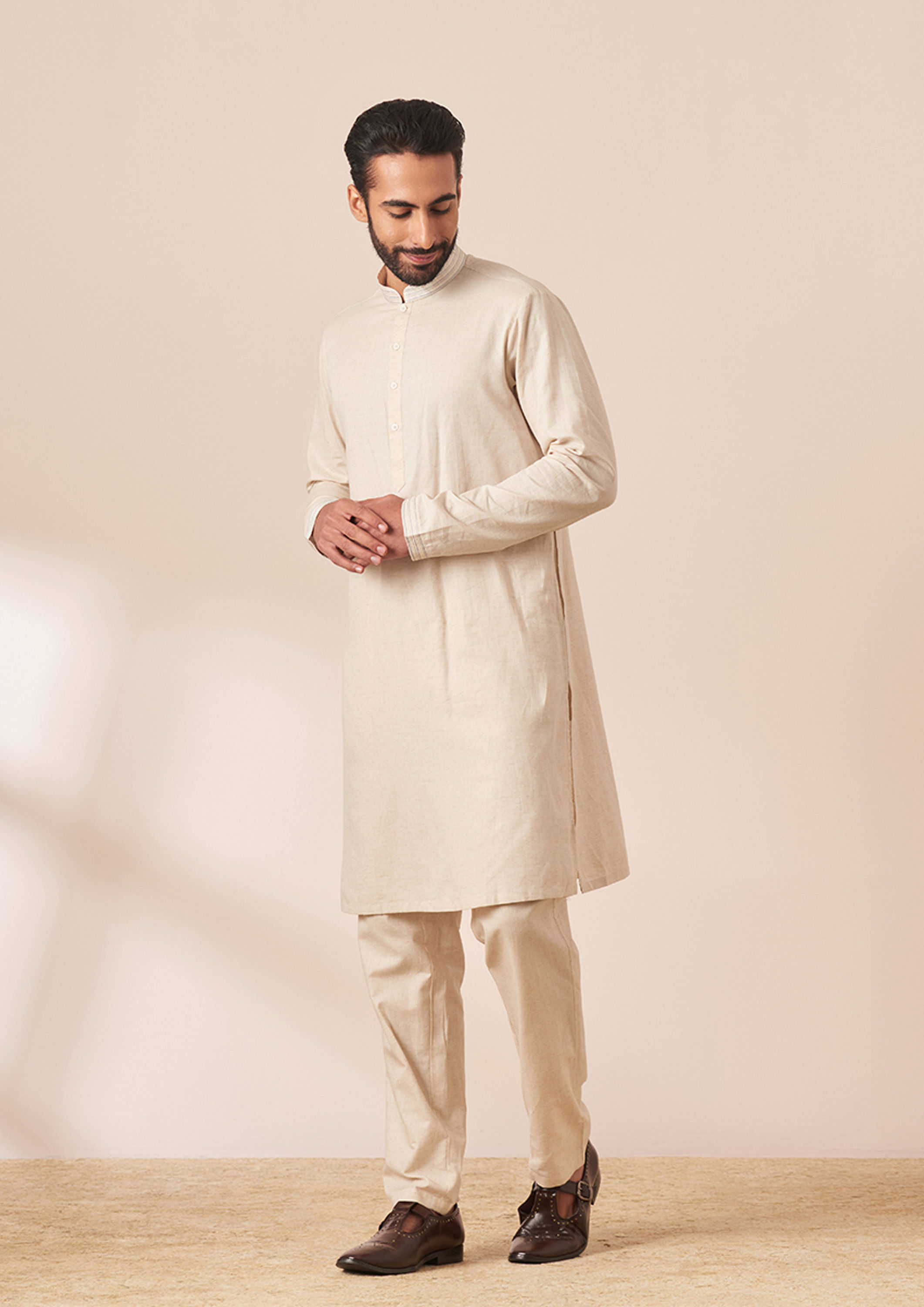 Twamev Men Cream Kurta Jacket Set with Multicolor Motifs