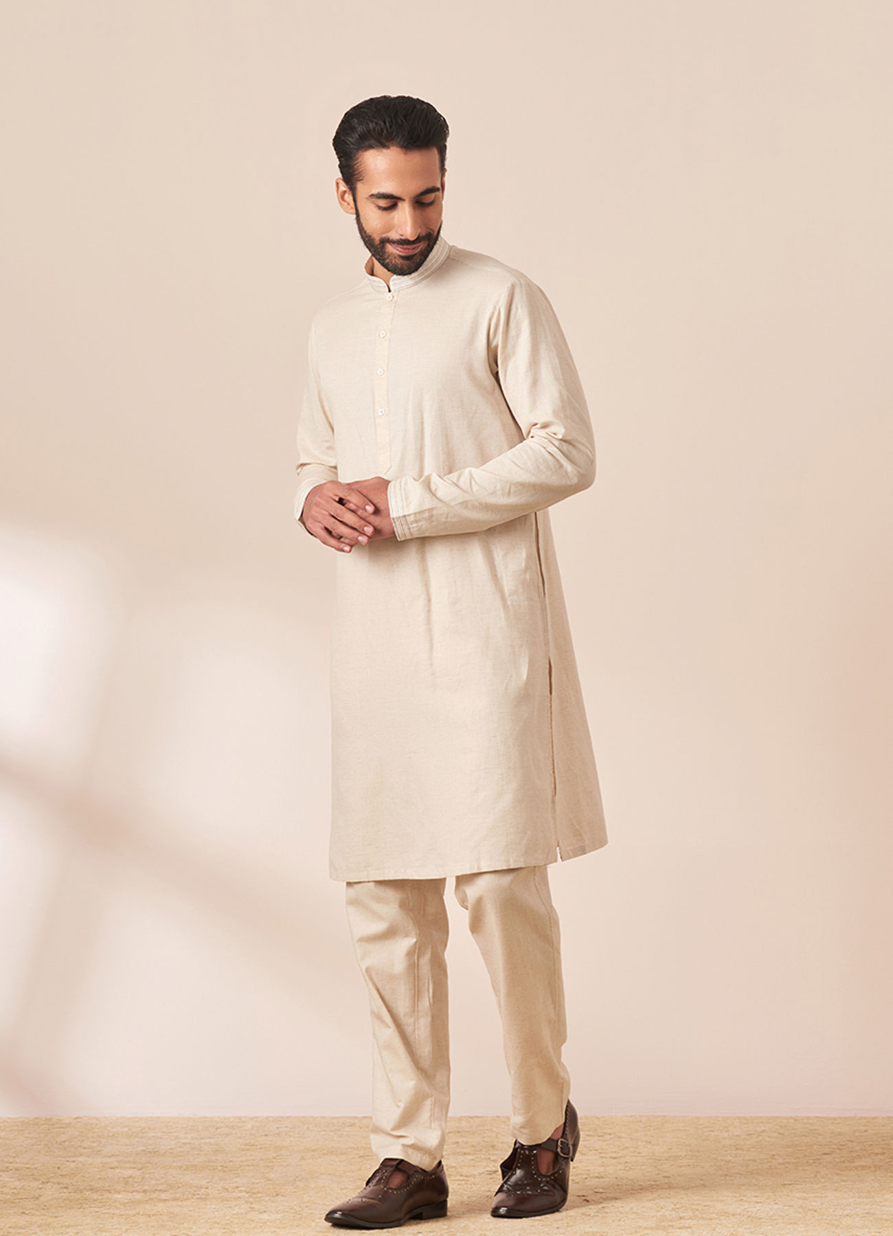 Twamev Men Cream Kurta Jacket Set with Multicolor Motifs
