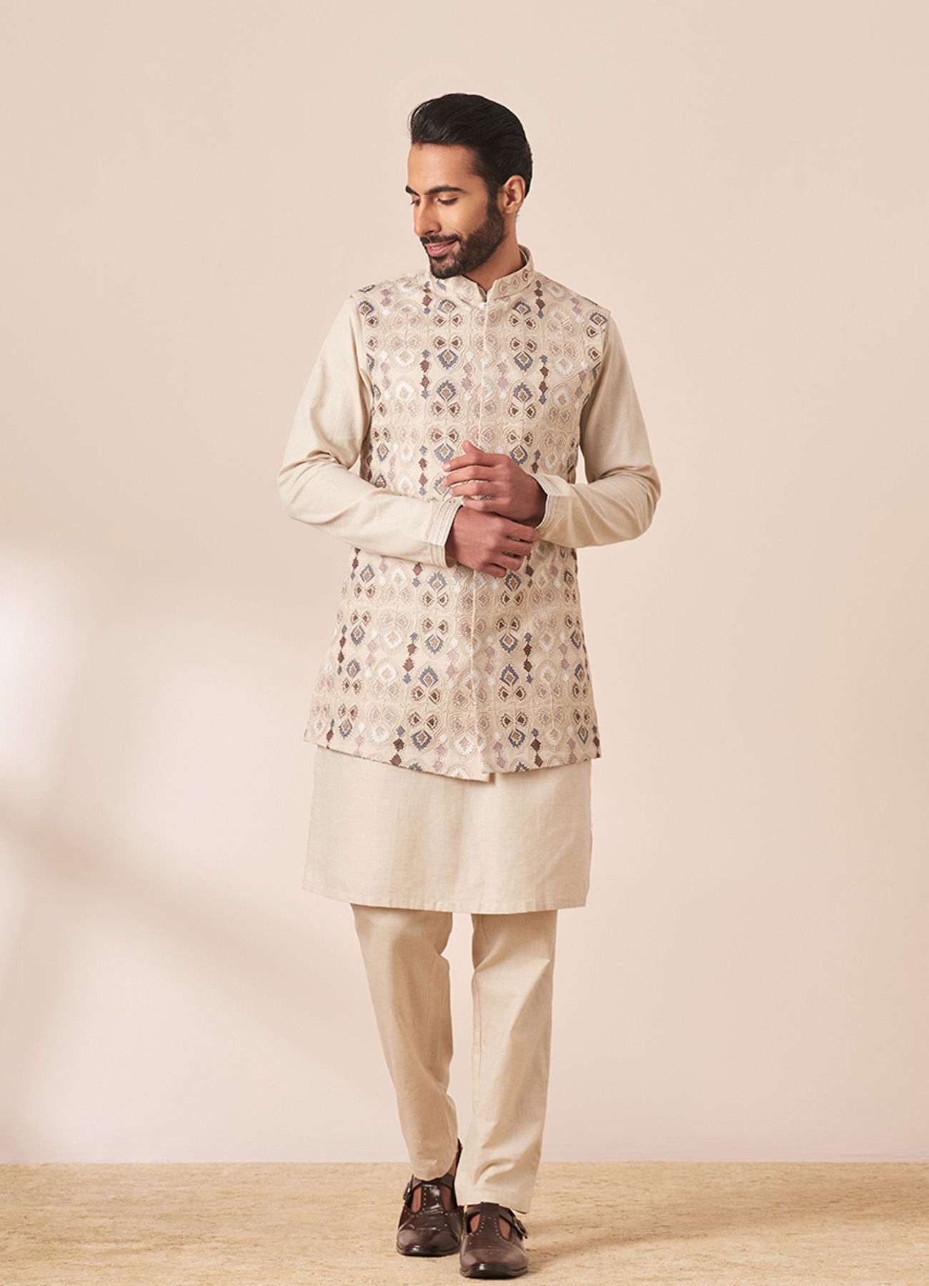 Twamev Men Cream Kurta Jacket Set with Multicolor Motifs