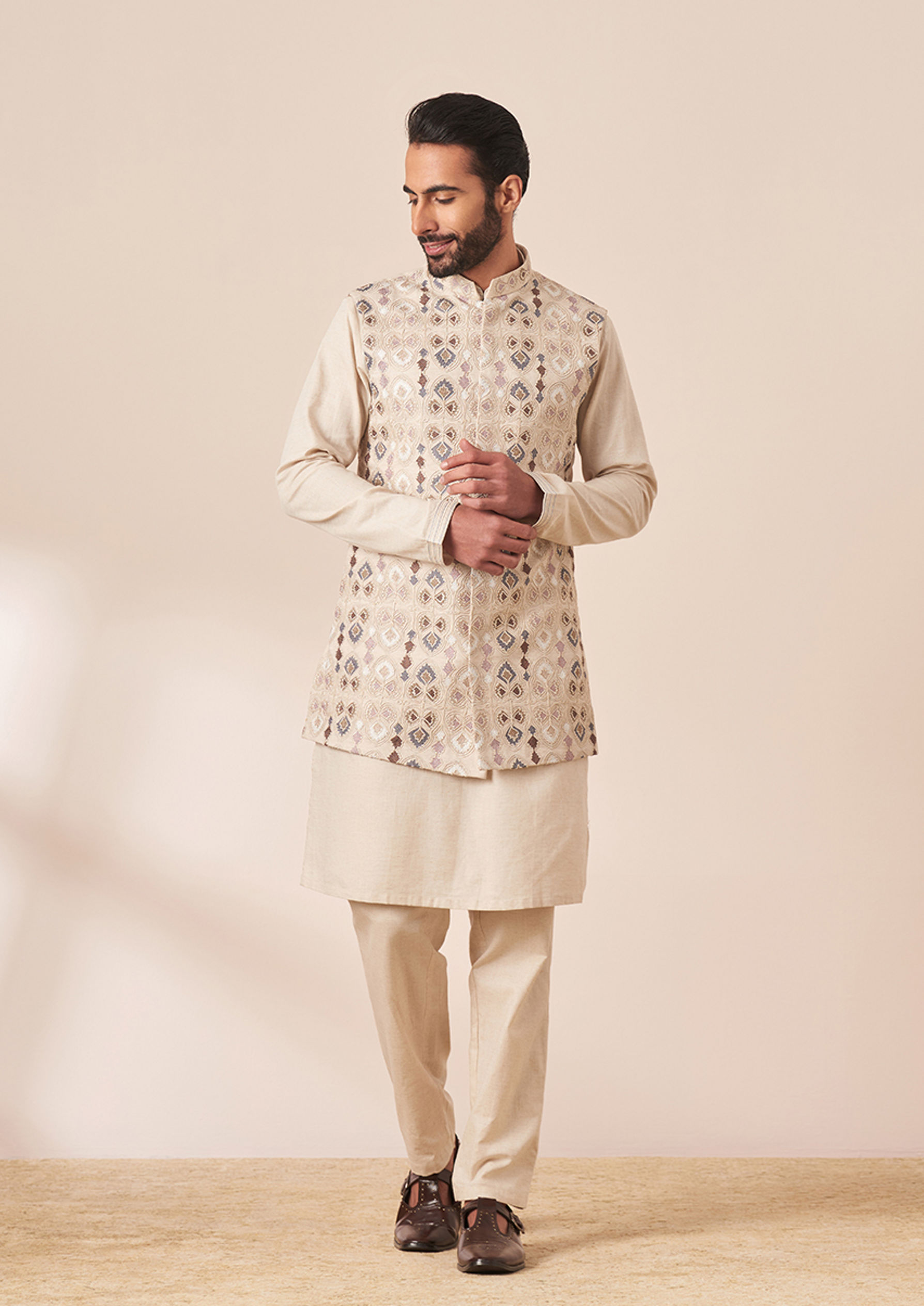 Twamev Men Cream Kurta Jacket Set with Multicolor Motifs