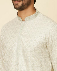 Twamev Men Pista Green Self Patterned Kurta set