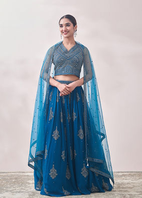 alt message - Mohey Women Turkish Sea Blue Jhallar Patterned Lehenga image number 0