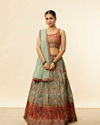 alt message - Mohey Women Sea Green and Rust Floral Printed Lehenga image number 0