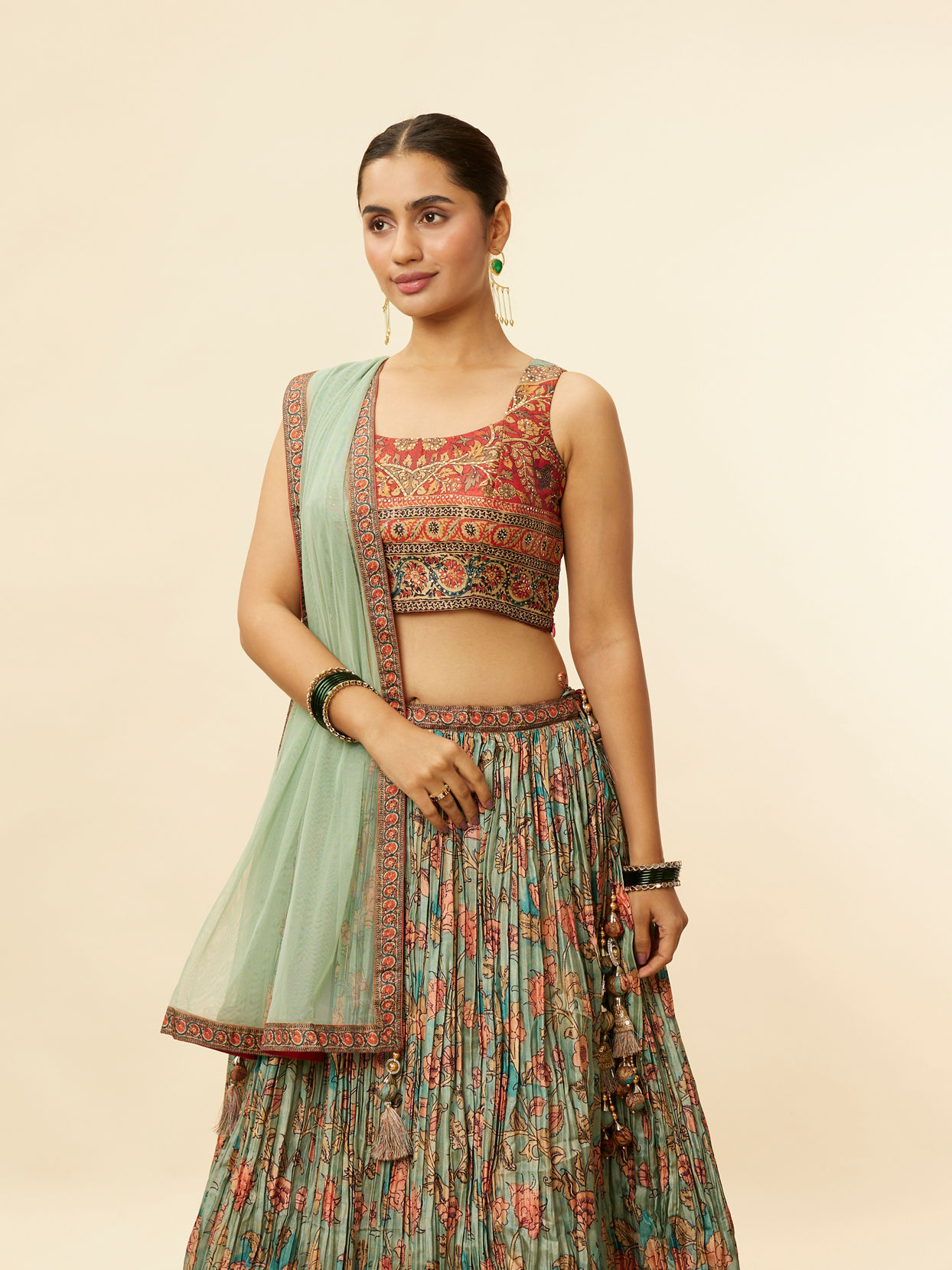 alt message - Mohey Women Sea Green and Rust Floral Printed Lehenga image number 1