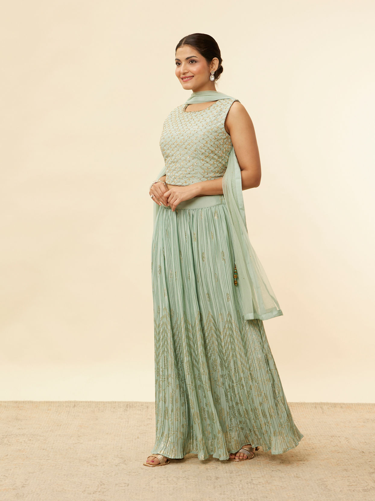 alt message - Mohey Women Sea Green Foil Print Sequin Work Lehenga image number 2