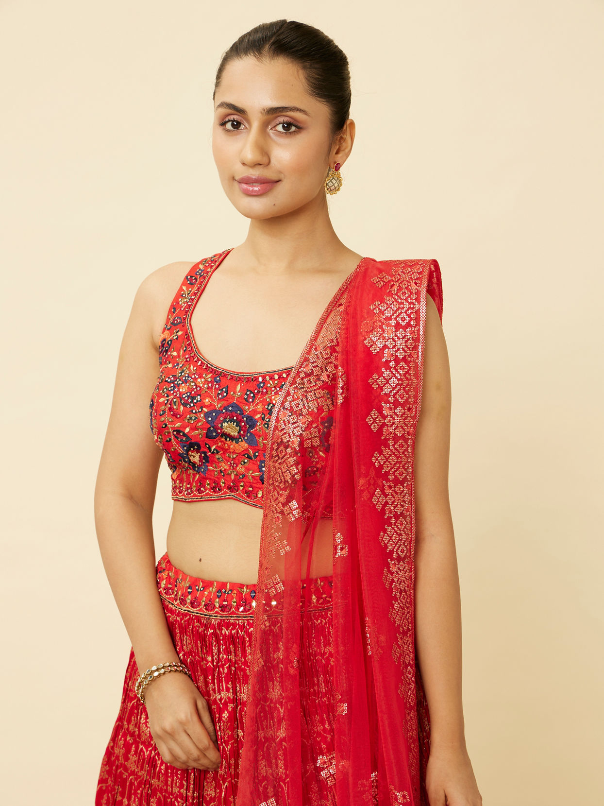 alt message - Mohey Women Fiesta Red Jaal Patterned Lehenga image number 1