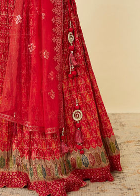 alt message - Mohey Women Fiesta Red Jaal Patterned Lehenga image number 4