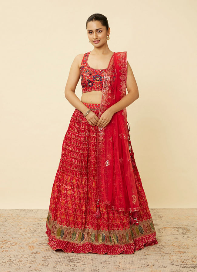 alt message - Mohey Women Fiesta Red Jaal Patterned Lehenga image number 0