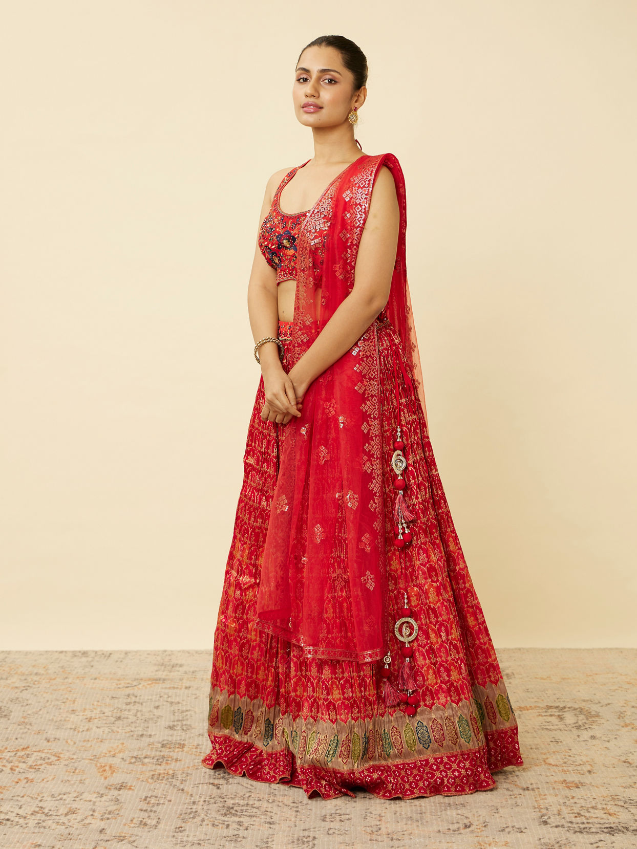 alt message - Mohey Women Fiesta Red Jaal Patterned Lehenga image number 2