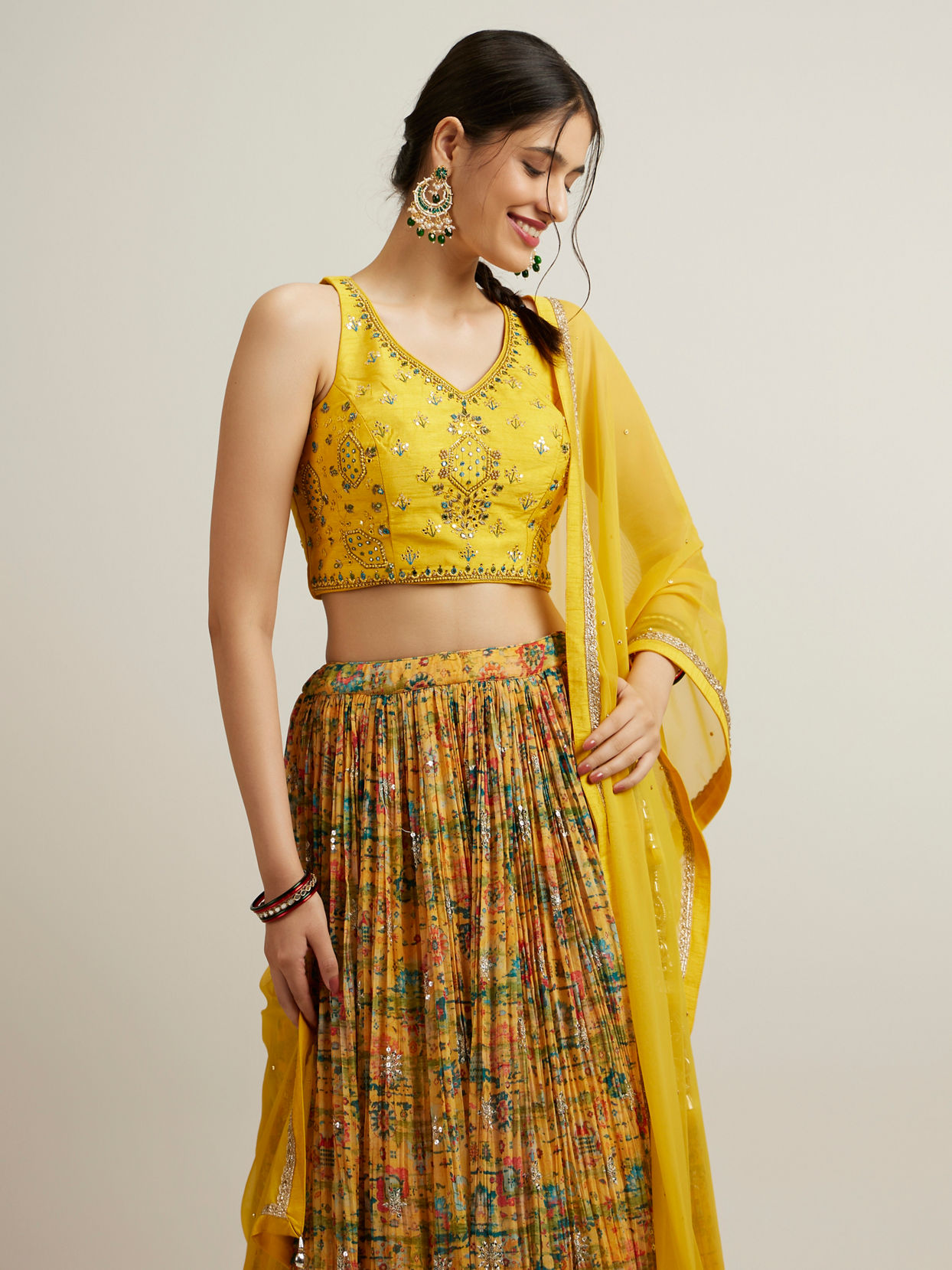 alt message - Mohey Women Mustard Georgette with Hand Embroidery and Sequins Lehenga image number 1