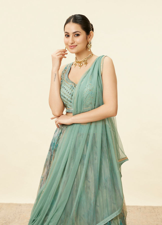 alt message - Mohey Women Sea Green Mirror Work Lehenga image number 1