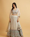 alt message - Mohey Women Cream Floral Paisley Patterned Sequinned Lehenga image number 0