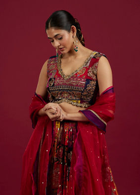 Mohey Women Orange Lehenga with Peacock Motifs