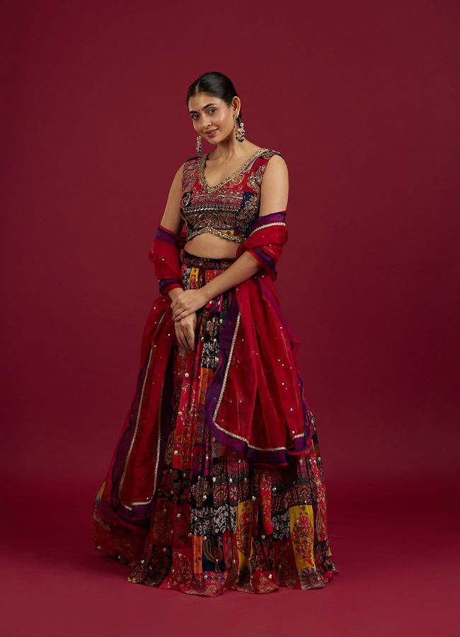 Mohey Women Orange Lehenga with Peacock Motifs