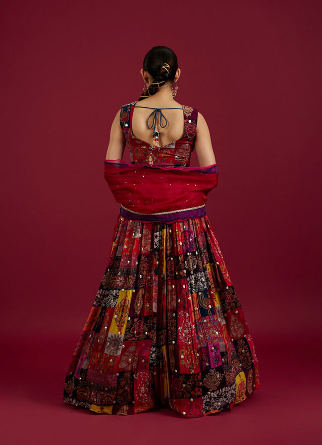 Mohey Women Orange Lehenga with Peacock Motifs