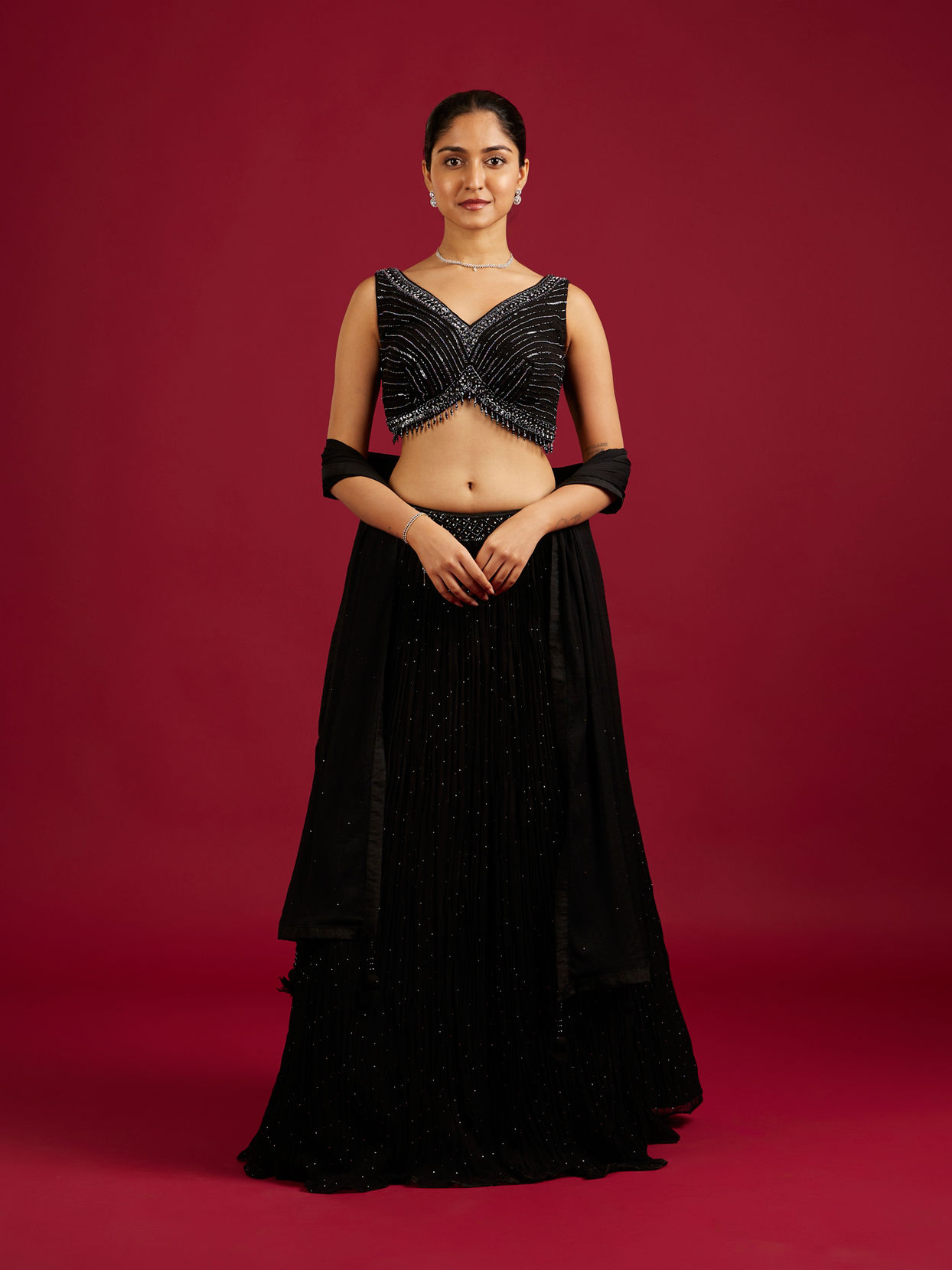 Mohey Women Midnight Black Cutdana And Sequin Embellished Crop Top Lehenga with Tassels