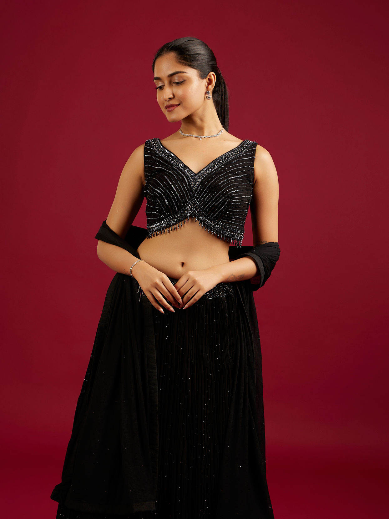 Mohey Women Midnight Black Cutdana And Sequin Embellished Crop Top Lehenga with Tassels