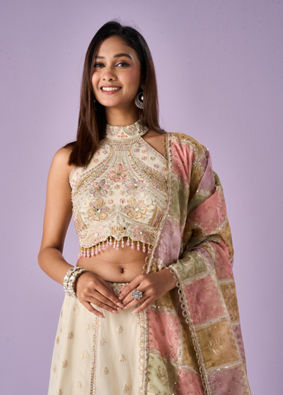 Mohey Women Cream Tissue Lehenga with Mirror Work