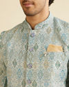 alt message - Manyavar Men Light Blue Conch Shell Patterned Kurta Set image number 1