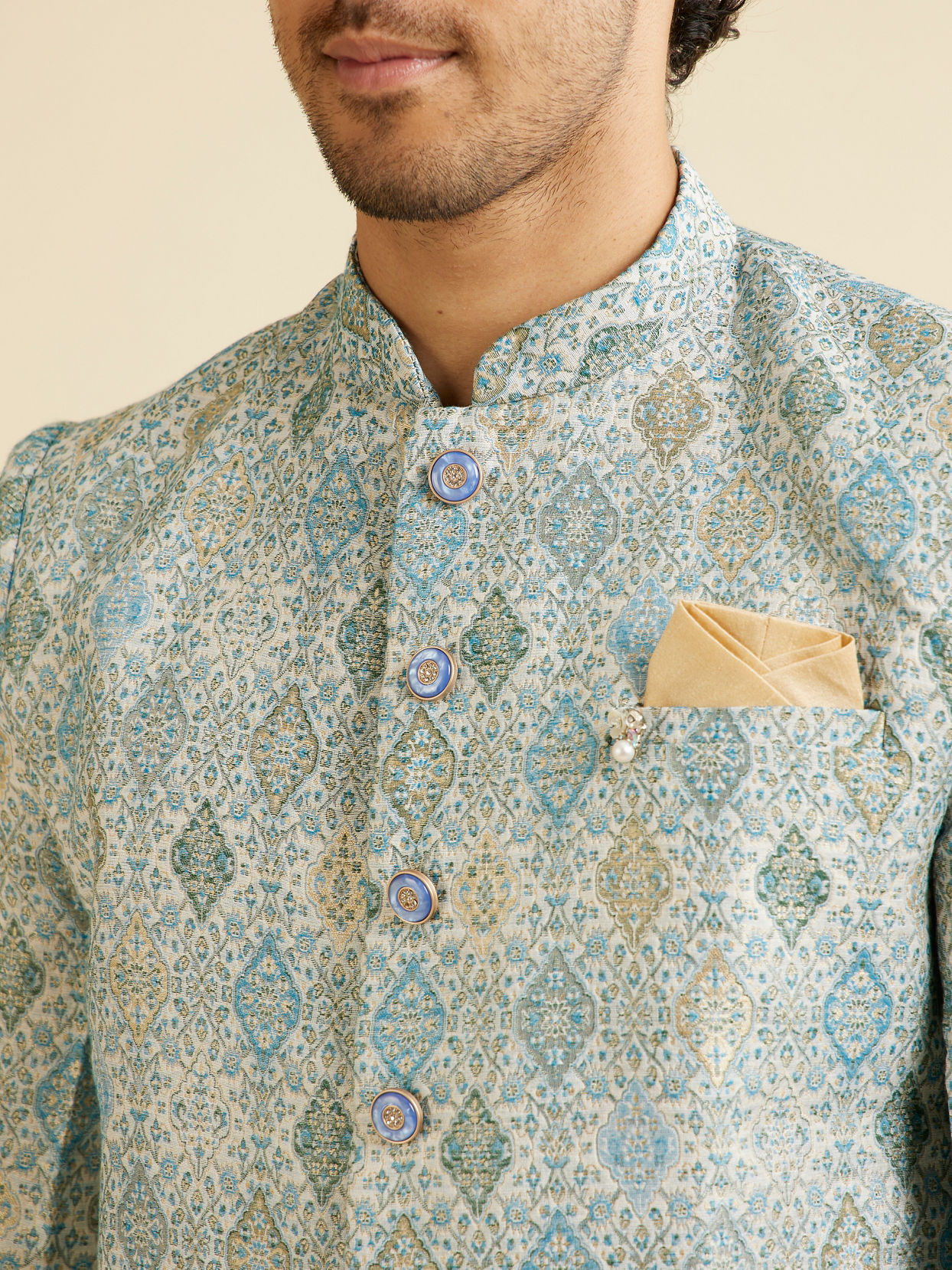 alt message - Manyavar Men Light Blue Conch Shell Patterned Kurta Set image number 1