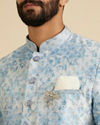 Manyavar Men Cornflower Blue Kurta Set with a Blend of Floral and Trellis Patterns image number 1