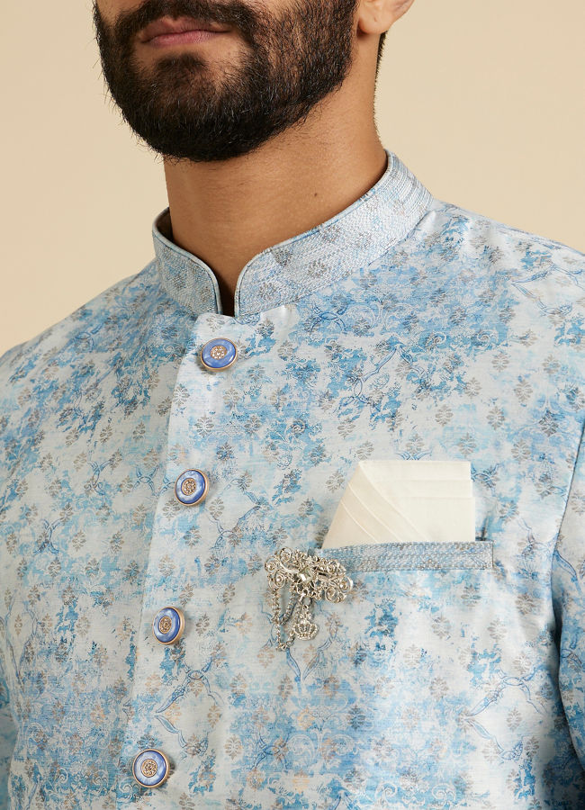 Manyavar Men Cornflower Blue Kurta Set with a Blend of Floral and Trellis Patterns image number 1