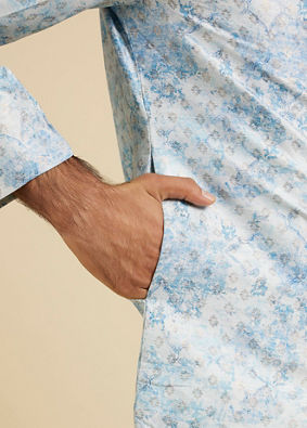 Manyavar Men Cornflower Blue Kurta Set with a Blend of Floral and Trellis Patterns image number 3