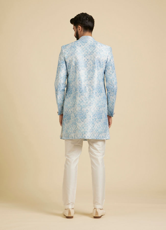 Manyavar Men Cornflower Blue Kurta Set with a Blend of Floral And Trellis Patterns